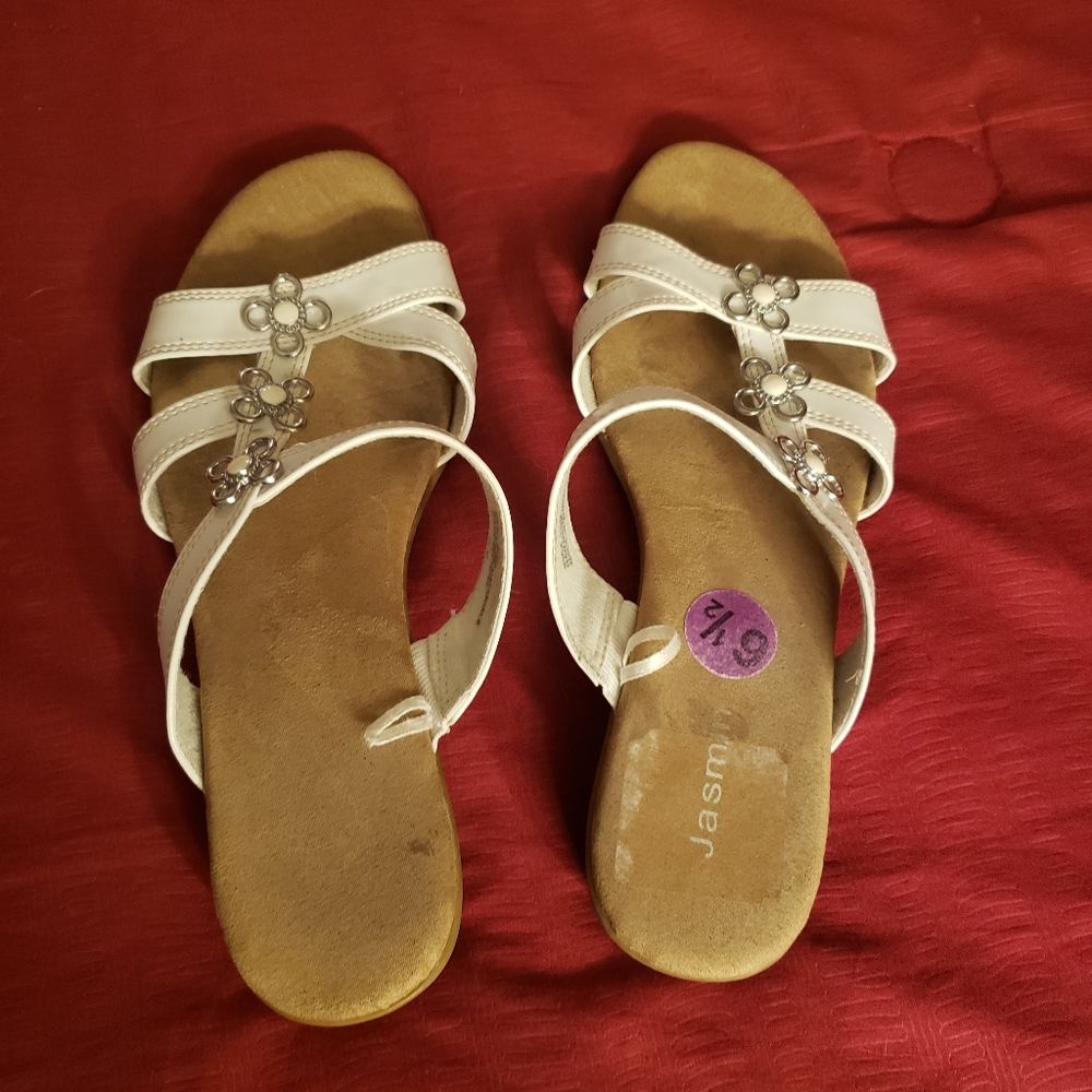 Cute white strappy sandals. Great shape. Comfy and well made with silver details